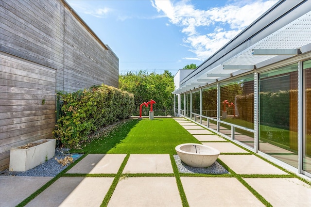 33 Vanguard Way, Dallas, TX 75243 - view of green lawn with a patio