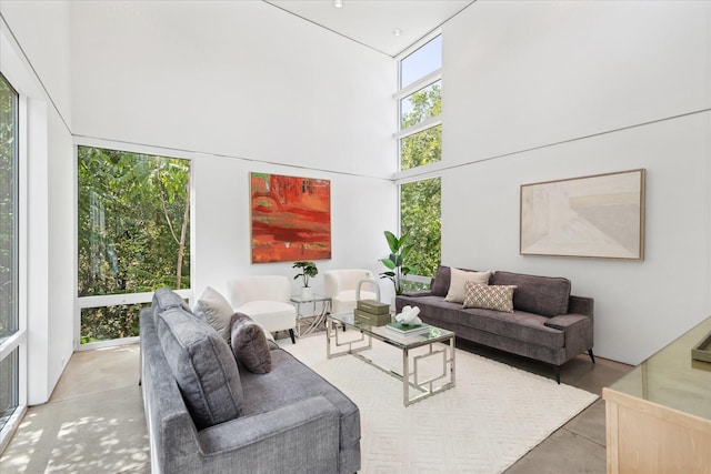 33 Vanguard Way, Dallas, TX 75243 - living room with finished concrete flooring and a high ceiling