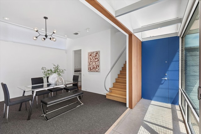 33 Vanguard Way, Dallas, TX 75243 - dining room featuring stairs, a chandelier, and tile patterned flooring