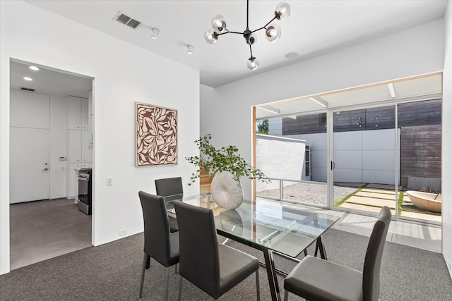 33 Vanguard Way, Dallas, TX 75243 - carpeted dining space featuring a chandelier
