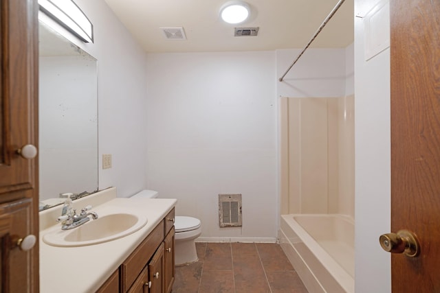 7487 Farm Rd Unit 905, Paris, TX 75462 - bathroom with vanity, toilet,  shower combination, heating unit, and baseboards