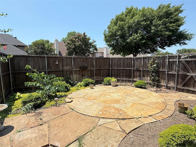 5205 Promise Land Dr, Frisco, TX 75035 - fenced backyard with a patio