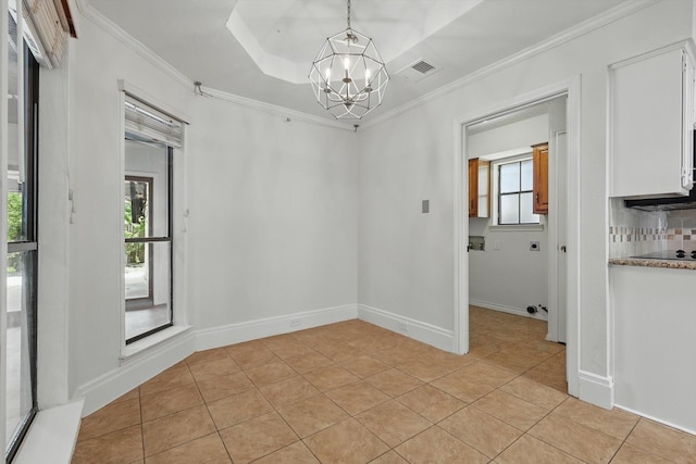 6509 Parkridge Dr, Sachse, TX 75048 - empty room with a chandelier, light tile patterned floors, ornamental molding, and plenty of natural light
