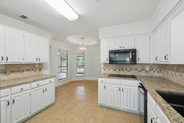 6509 Parkridge Dr, Sachse, TX 75048 - kitchen featuring black electric cooktop, light tile patterned flooring, dishwashing machine, a chandelier, and white cabinets