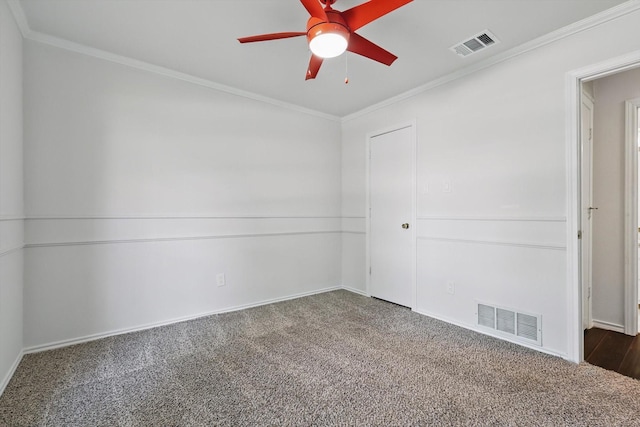 6509 Parkridge Dr, Sachse, TX 75048 - unfurnished room featuring dark colored carpet, crown molding, ceiling fan, and baseboards