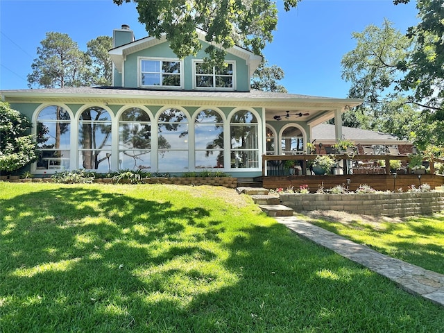 13449 S Hillcreek Rd, Whitehouse, TX 75791 - view of front of home featuring a front yard, ceiling fan, and a chimney