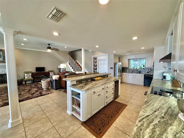 13449 S Hillcreek Rd, Whitehouse, TX 75791 - kitchen featuring stainless steel refrigerator with ice dispenser, black dishwasher, decorative columns, ceiling fan, and under cabinet range hood