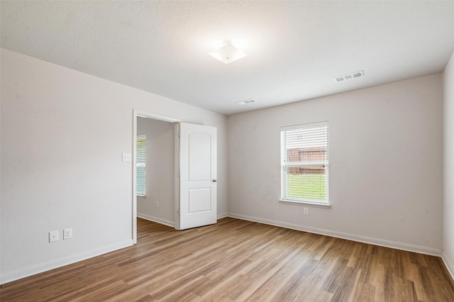 1206 Lombardy Dr, Princeton, TX 75407 - unfurnished room with wood finished floors and baseboards