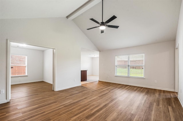 1206 Lombardy Dr, Princeton, TX 75407 - unfurnished living room featuring beamed ceiling, ceiling fan, wood finished floors, high vaulted ceiling, and baseboards