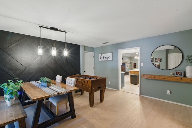 945 Lake Ridge Dr, Azle, TX 76020 - recreation room with light wood-style flooring and baseboards