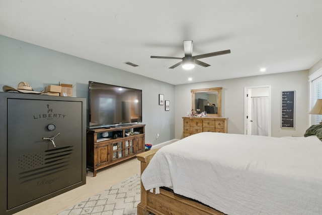 945 Lake Ridge Dr, Azle, TX 76020 - bedroom featuring light wood-style floors, a ceiling fan, and recessed lighting
