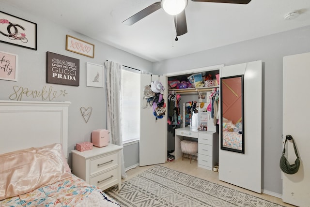 945 Lake Ridge Dr, Azle, TX 76020 - bedroom with a closet, baseboards, and a ceiling fan
