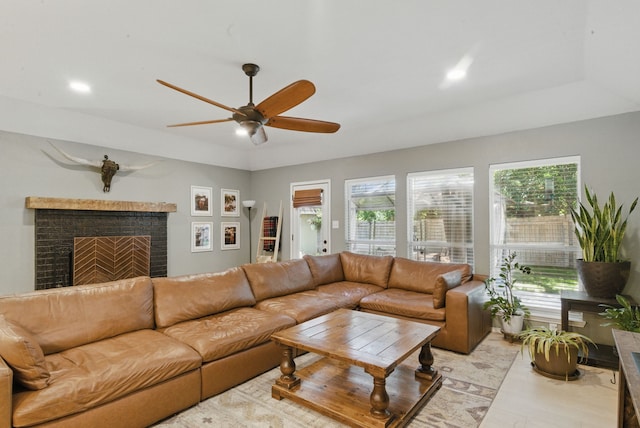 945 Lake Ridge Dr, Azle, TX 76020 - living area with plenty of natural light, a ceiling fan, a brick fireplace, light wood-type flooring, and recessed lighting