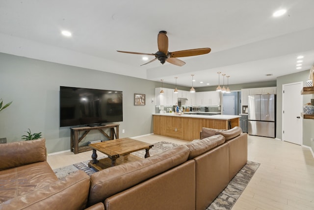 945 Lake Ridge Dr, Azle, TX 76020 - living room with baseboards, recessed lighting, a ceiling fan, and light wood-style flooring