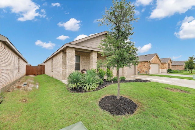 16561 Portage St, Justin, TX 76247 - view of front of home featuring brick siding, driveway, a gate, and a garage