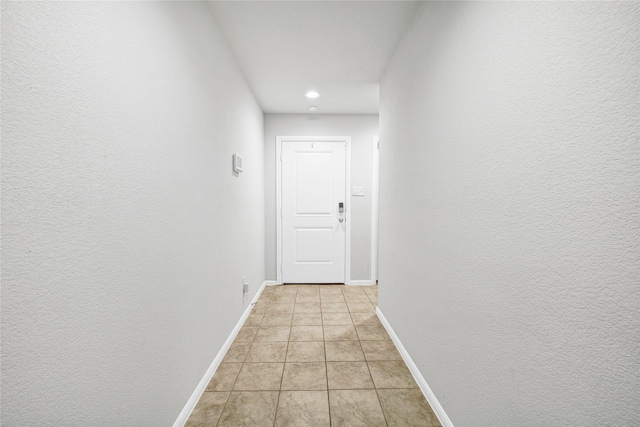 16561 Portage St, Justin, TX 76247 - hallway featuring light tile patterned flooring, baseboards, and recessed lighting