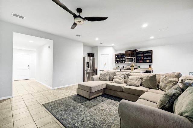 16561 Portage St, Justin, TX 76247 - living room featuring light tile patterned flooring, a ceiling fan, recessed lighting, and baseboards