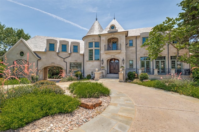 2145 Grand View Ct, Cedar Hill, TX 75104 - french provincial home with a balcony, french doors, and stucco siding
