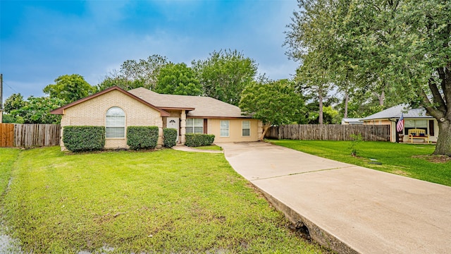 906 Pear Ct, Joshua, TX 76058 - ranch-style house featuring concrete driveway and brick siding