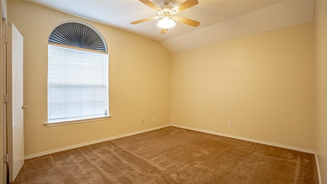 906 Pear Ct, Joshua, TX 76058 - carpeted spare room featuring a ceiling fan, baseboards, and vaulted ceiling