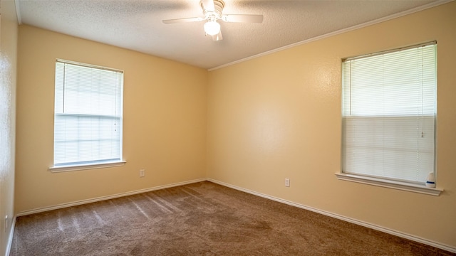 906 Pear Ct, Joshua, TX 76058 - unfurnished room with carpet floors, a textured ceiling, a ceiling fan, crown molding, and baseboards