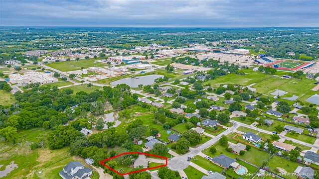 906 Pear Ct, Joshua, TX 76058 - aerial view of property's location with property parcel outlined and a nearby body of water