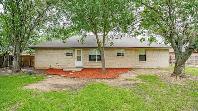 906 Pear Ct, Joshua, TX 76058 - rear view of house featuring brick siding and a shingled roof