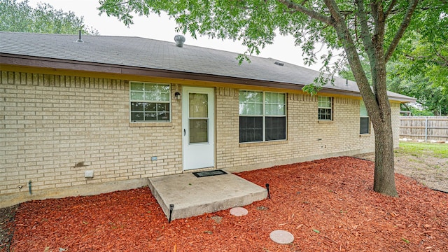 906 Pear Ct, Joshua, TX 76058 - back of house with brick siding and roof with shingles