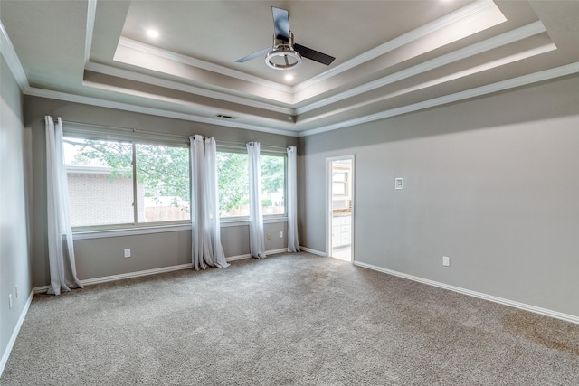 3719 Douglas Ave, Dallas, TX 75219 - unfurnished room with a tray ceiling, carpet floors, crown molding, and ceiling fan