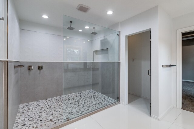 3719 Douglas Ave, Dallas, TX 75219 - bathroom with a stall shower, recessed lighting, and tile patterned floors