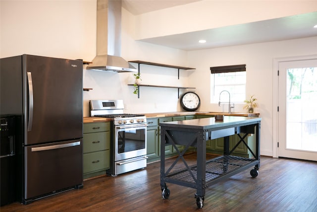 360 Michael Ln, Sunnyvale, TX 75182 - kitchen with stainless steel appliances, green cabinetry, ventilation hood, wooden counters, and open shelves