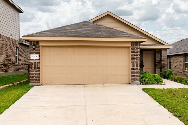 125 Running River Dr, Boyd, TX 76023 - ranch-style home with brick siding, concrete driveway, an attached garage, and roof with shingles