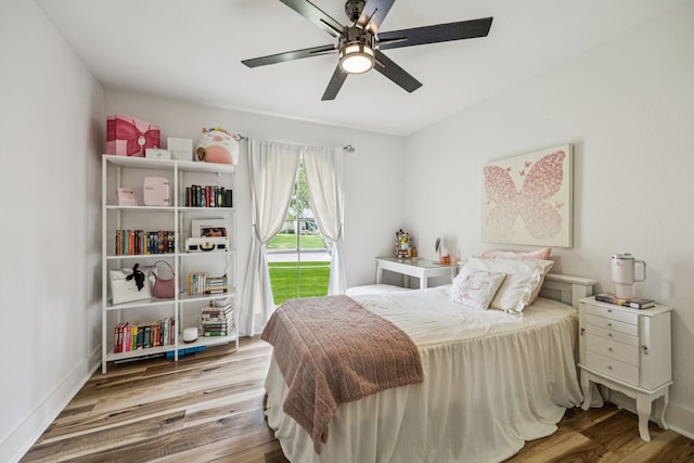 6607 Leameadow Dr, Dallas, TX 75248 - bedroom featuring access to exterior, wood finished floors, ceiling fan, and baseboards