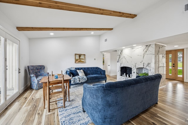 6607 Leameadow Dr, Dallas, TX 75248 - living room with recessed lighting, light wood finished floors, and a premium fireplace