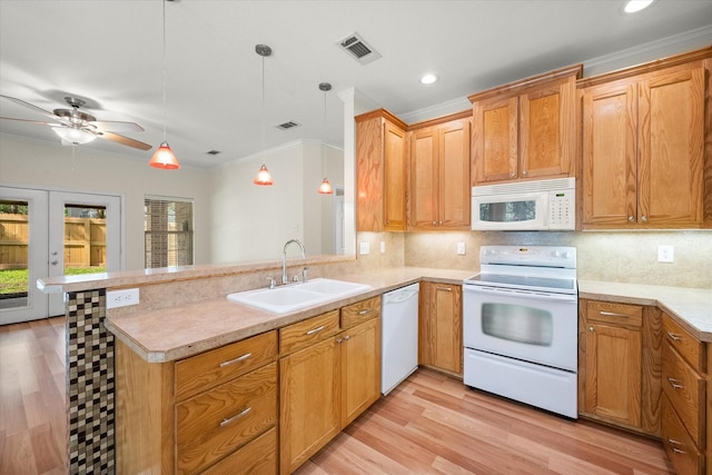 143 Doe Run Rd, Gun Barrel City, TX 75156 - kitchen featuring white appliances, a sink, plenty of natural light, crown molding, and decorative backsplash