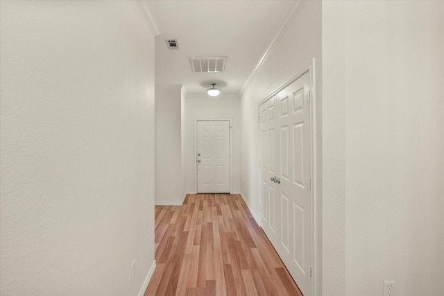 143 Doe Run Rd, Gun Barrel City, TX 75156 - hallway featuring ornamental molding, baseboards, and light wood-type flooring