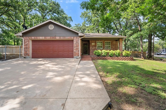 143 Doe Run Rd, Gun Barrel City, TX 75156 - single story home featuring a garage, brick siding, and concrete driveway