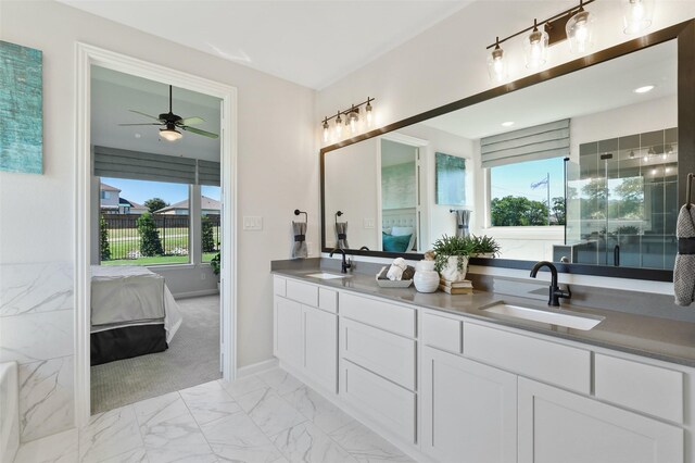 1417 Red Clover Ave, Van Alstyne, TX 75495 - full bathroom with ensuite bathroom, healthy amount of natural light, double vanity, and marble look tile flooring
