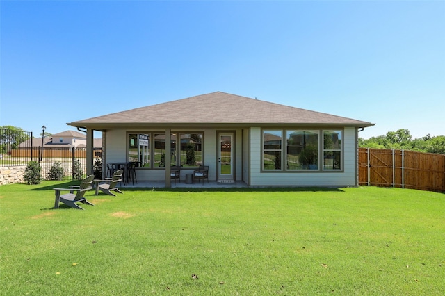 1417 Red Clover Ave, Van Alstyne, TX 75495 - rear view of house with a shingled roof