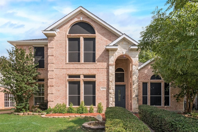 8209 Shoshoni Dr, Arlington, TX 76002 - view of front of house featuring brick siding and a front lawn