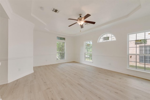 8209 Shoshoni Dr, Arlington, TX 76002 - unfurnished room with a raised ceiling, light wood-style flooring, ceiling fan, baseboards, and a smoke detector