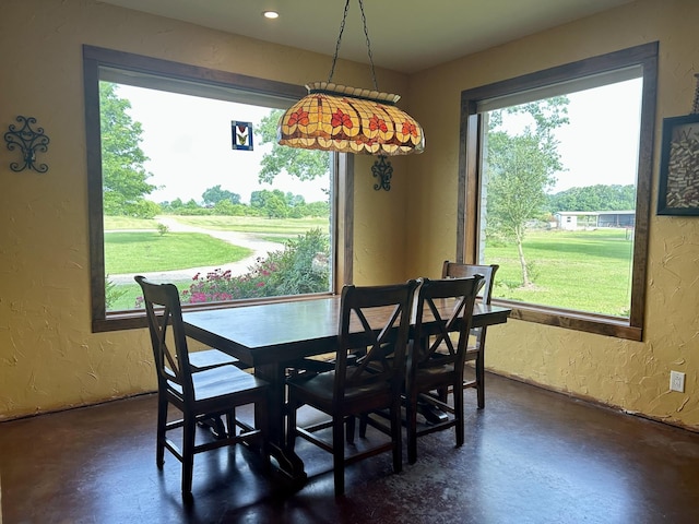 2250 Vz County Road 2301, Canton, TX 75103 - dining area with a textured wall and concrete flooring