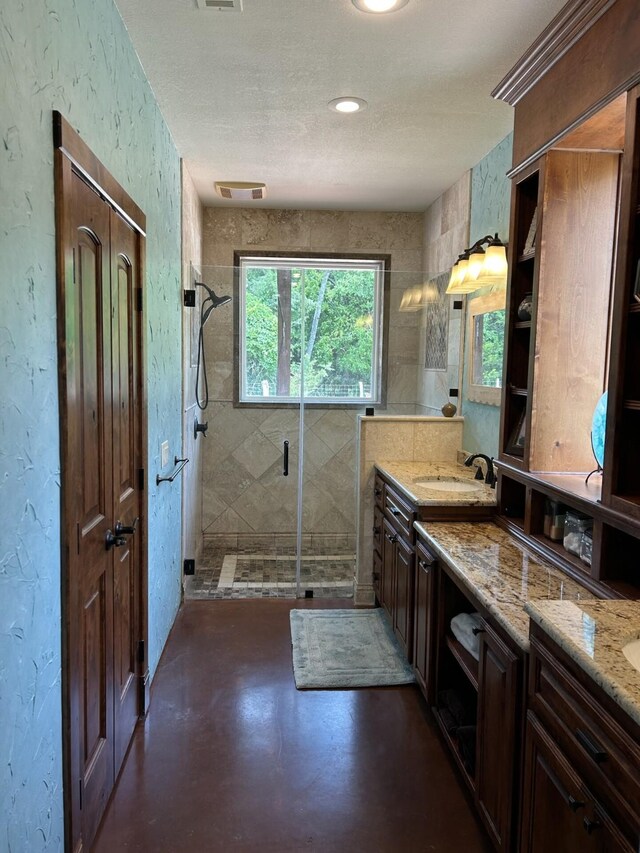 2250 Vz County Road 2301, Canton, TX 75103 - full bathroom with a stall shower, concrete floors, vanity, and a textured wall