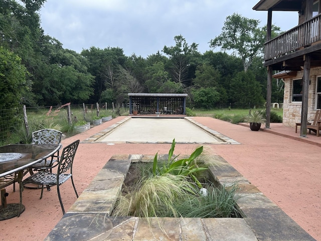 2250 Vz County Road 2301, Canton, TX 75103 - view of patio / terrace featuring a game area, a forest view, and outdoor dining space