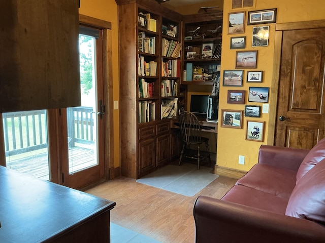 2250 Vz County Road 2301, Canton, TX 75103 - living area featuring wood finished floors, built in features, and an office area