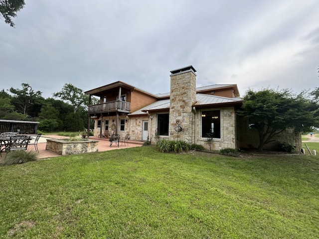 2250 Vz County Road 2301, Canton, TX 75103 - back of property featuring stone siding, a patio area, a chimney, and a balcony