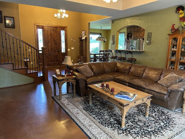 2250 Vz County Road 2301, Canton, TX 75103 - living room featuring concrete flooring, a chandelier, a textured wall, and stairway