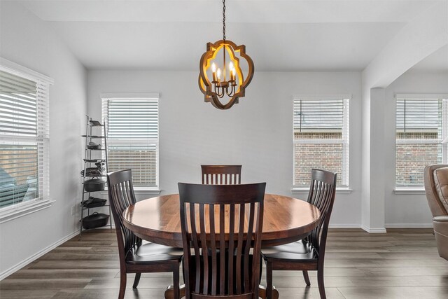 3128 Autry Rd, Lorena, TX 76655 - dining space featuring a chandelier, wood finished floors, plenty of natural light, and baseboards
