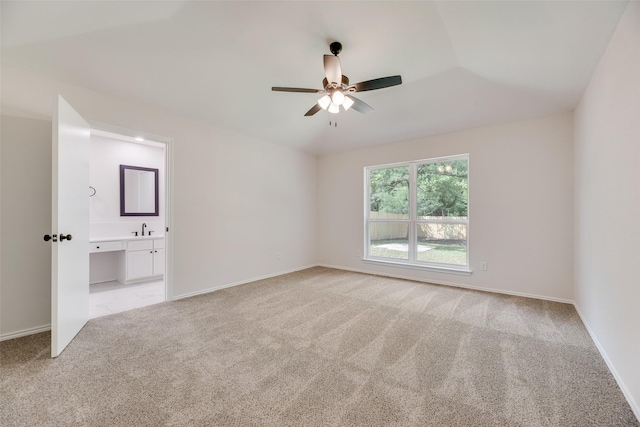 6102 Azalea Dr, Rowlett, TX 75089 - empty room with a ceiling fan, light colored carpet, a sink, and baseboards