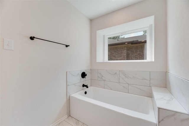 6102 Azalea Dr, Rowlett, TX 75089 - bathroom with a bath and baseboards